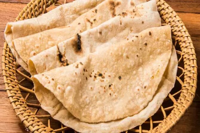 Cooking class & meal (Indian Food) with local family in Jaipur. - Rolling Chapattis by Hand