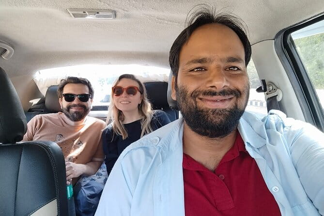 Jaipur Pink City Tour by Car or Tuk-Tuk - Jal Mahal, a quick lakeside pause