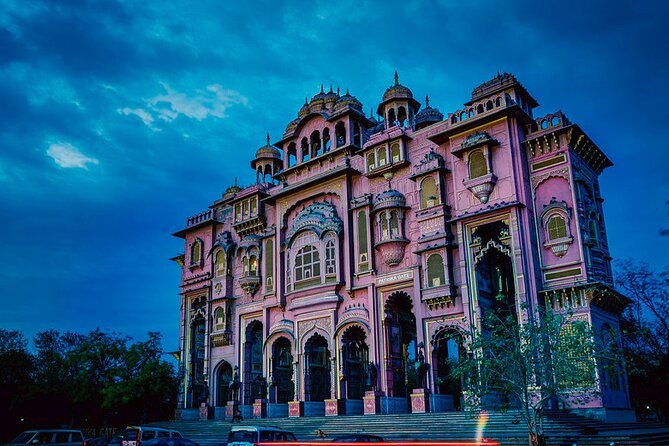 Private Jaipur Night Tour with Nahargarh Sunset Views - Albert Hall glows beside the evening traffic